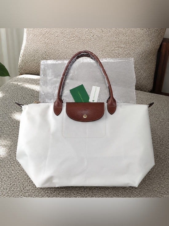 Longchamp Handbags - Longchamp White Tote with Brown Leather Trim and Handles